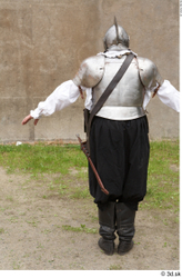  Photos Medieval Guard in plate armor 7 